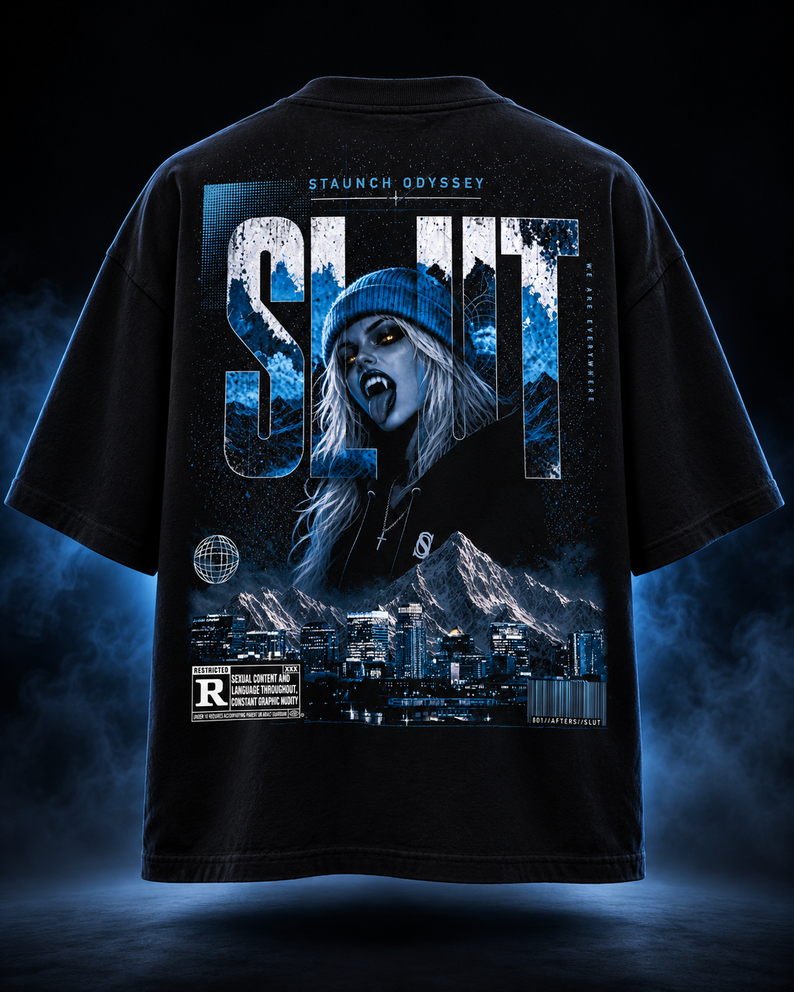 A black graphic t-shirt shown from the back, featuring a large blue-toned design with the word 'SLUT', a stylized woman's face, mountains, a city skyline, and text reading 'STAUNCH ODYSSEY'. The shirt is centered against a dark smoky blue background.
